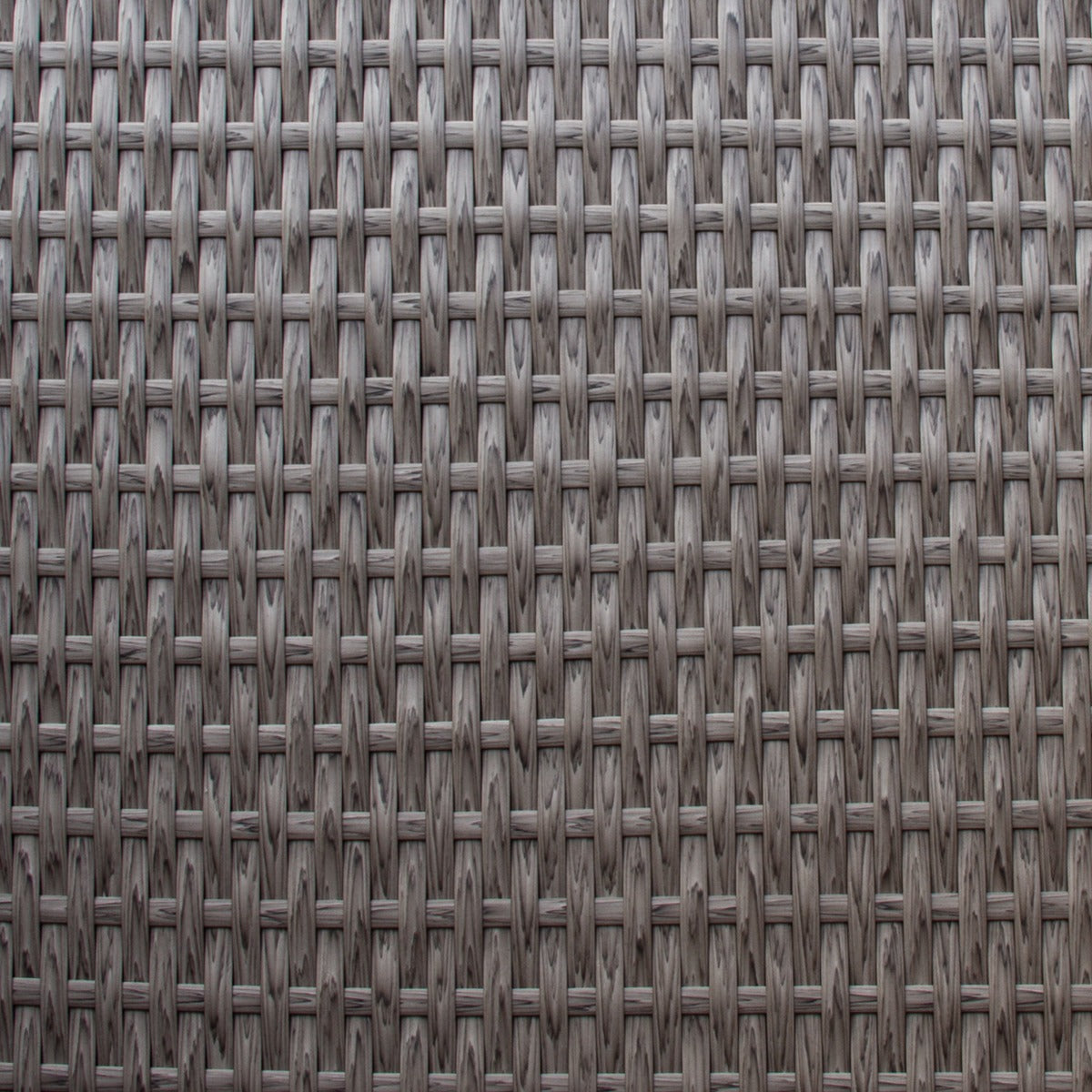 Grijze polyrattan structuur met een geweven patroon, ideaal voor een moderne hoekmeubelset in de tuin of op het balkon