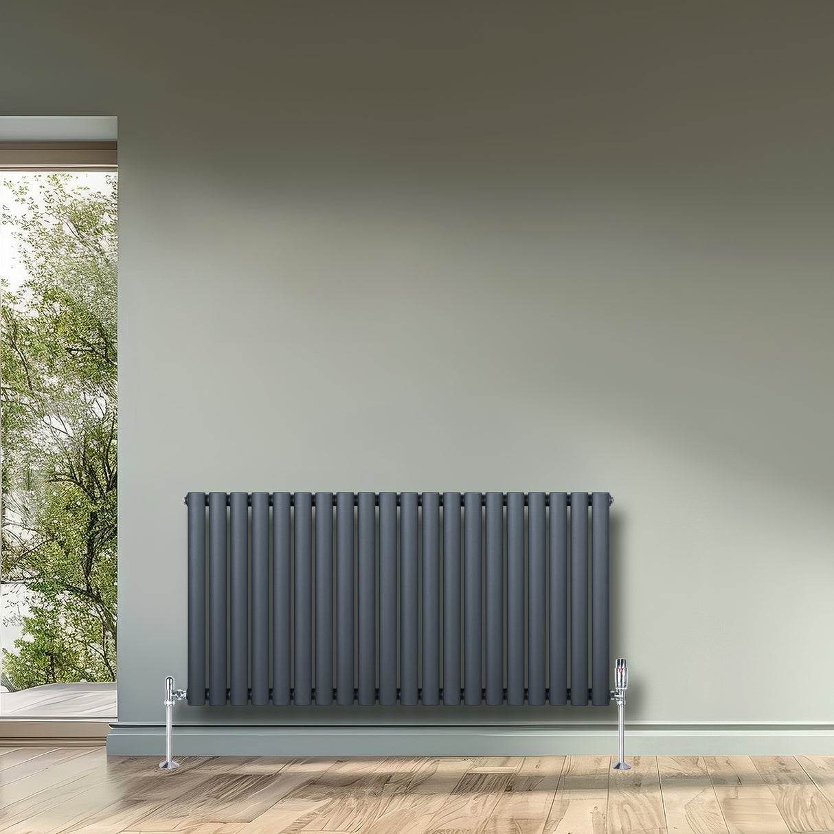 Ovale design radiator in antraciet grijs, 1 kolom, 600 mm x 1200 mm, met een moderne, strakke uitstraling en verticale lamellen