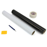Zwart en wit vinylsnijfolie op rollen, een snijmes, tape en een schraper, ideaal voor het maken van ontwerpen en stickers