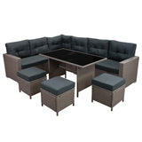 Polyrattan hoekmeubelset in grijs met comfortabele kussens, een glazen tafelblad en bijpassende poefs voor buitengebruik