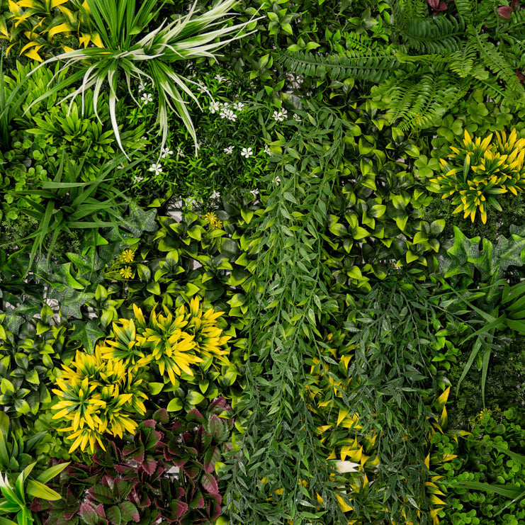 Een weelderige mix van groene en gele kunstplanten met verschillende texturen en vormen, perfect voor decoratie en sfeer