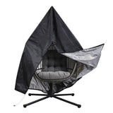 Zwarte rotan hangstoel met een zachte, grijze kussen en een unieke, tentachtige vorm voor extra comfort en stijl