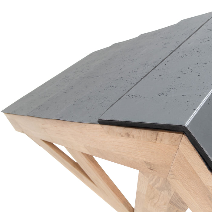 Zwarte, gestructureerde tafelblad met een houten onderstel, elegant en modern, perfect voor een eigentijdse inrichting