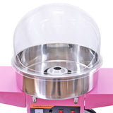 Roze suikerspinmachine met een glanzende roestvrijstalen kom en een doorzichtige beschermkap, ideaal voor feesten en evenementen