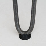 Grijze vloerbeschermers voor hairpin tafelpoten van 12 mm, met een stevige, ronde basis en een gladde, matte afwerking